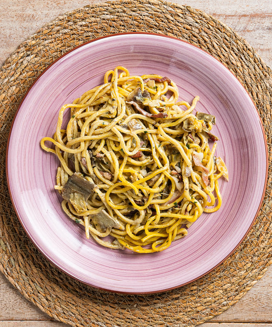 Chitarrine con Carciofi e Speck Alto Adige IGP